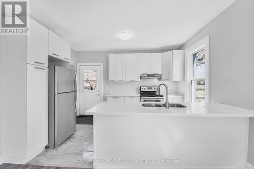 130 Mary Street, Brantford, ON - Indoor Photo Showing Kitchen With Double Sink