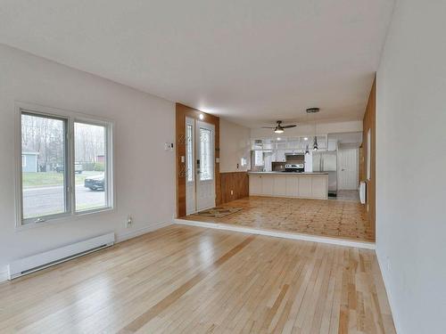 Living room - 380 Rue Lucien, Lavaltrie, QC - Indoor Photo Showing Other Room