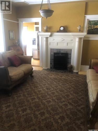 2915 Victoria Avenue, Regina, SK - Indoor Photo Showing Living Room With Fireplace