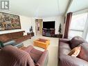 118 Cedar Avenue N, Eastend, SK  - Indoor Photo Showing Living Room 