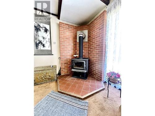 2480 First Avenue, Terrace, BC - Indoor Photo Showing Other Room With Fireplace