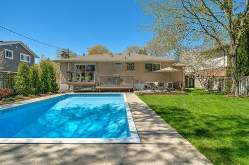 4456 Tremineer Avenue, Burlington, ON - Outdoor With In Ground Pool With Deck Patio Veranda With Backyard