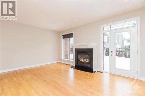141 Manorhill Private, Ottawa, ON - Indoor Photo Showing Living Room With Fireplace
