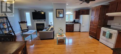 461 Creston Boulevard, Marystown, NL - Indoor Photo Showing Kitchen With Fireplace