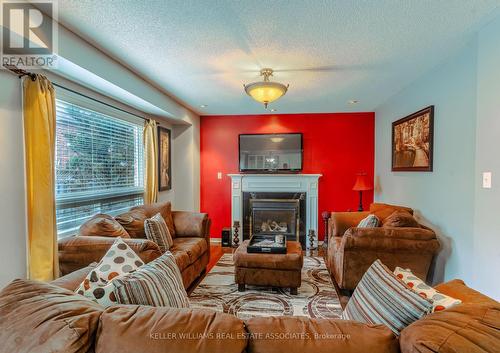 56 Lockheed Crescent, Brampton, ON - Indoor Photo Showing Living Room With Fireplace