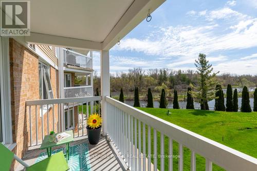 102 - 50 Rivermill Boulevard, Kawartha Lakes, ON - Outdoor With Balcony With Exterior