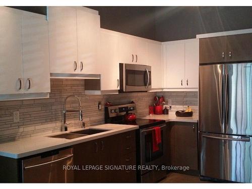 318-2 Fieldway Rd, Toronto, ON - Indoor Photo Showing Kitchen With Double Sink With Upgraded Kitchen