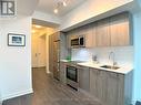 2406 - 28 Wellesley Street E, Toronto, ON  - Indoor Photo Showing Kitchen With Upgraded Kitchen 