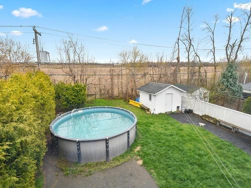 Cour - 1495 Crois. Nelligan, Mascouche, QC - Outdoor With Above Ground Pool With Backyard