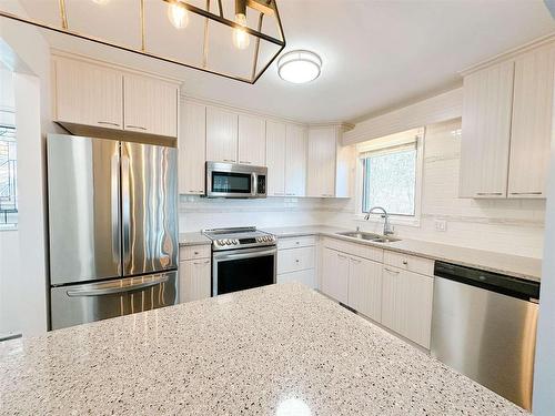 1 35 Nash Street, Kenora, ON - Indoor Photo Showing Kitchen With Double Sink
