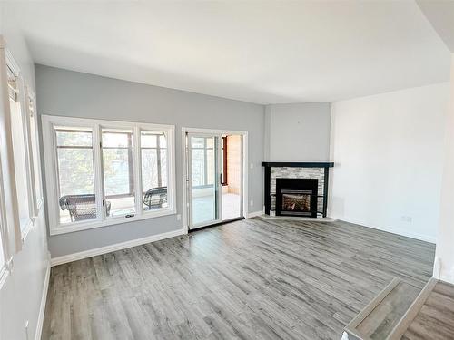 1 35 Nash Street, Kenora, ON - Indoor Photo Showing Living Room With Fireplace