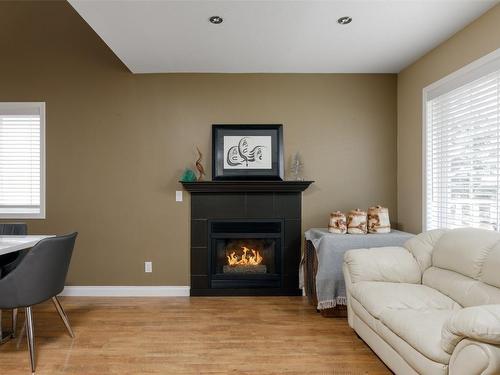 139 Millard Place, Kelowna, BC - Indoor Photo Showing Living Room With Fireplace