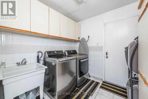 30 Houndtrail Drive, Toronto, ON - Indoor Photo Showing Laundry Room