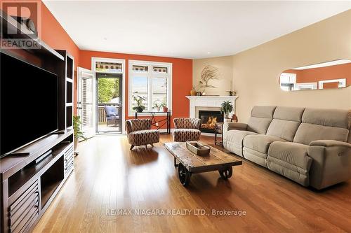 26 Emerald Common, St. Catharines, ON - Indoor Photo Showing Living Room With Fireplace