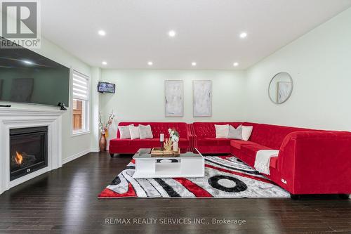 24 Spokanne Street N, Brampton, ON - Indoor Photo Showing Living Room With Fireplace
