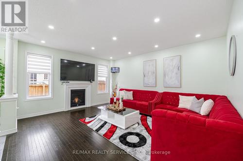 24 Spokanne Street N, Brampton, ON - Indoor Photo Showing Living Room With Fireplace
