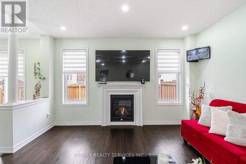 24 Spokanne Street N, Brampton, ON - Indoor Photo Showing Living Room With Fireplace