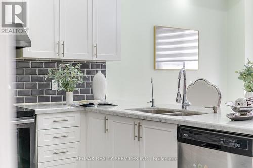 24 Spokanne Street N, Brampton (Sandringham-Wellington North), ON - Indoor Photo Showing Kitchen With Double Sink With Upgraded Kitchen