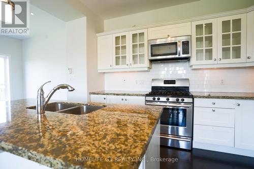 47 Videl Crescent N, St. Catharines, ON - Indoor Photo Showing Kitchen With Double Sink