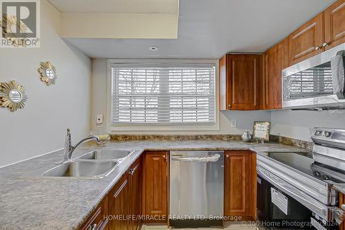 109 - 37 Four Winds Drive, Toronto, ON - Indoor Photo Showing Kitchen With Double Sink