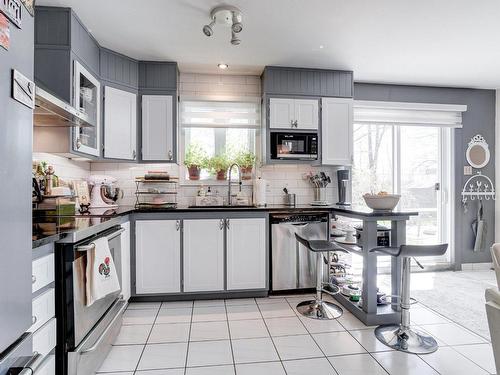 Cuisine - 594 Rue De Providence, Repentigny (Repentigny), QC - Indoor Photo Showing Kitchen With Upgraded Kitchen