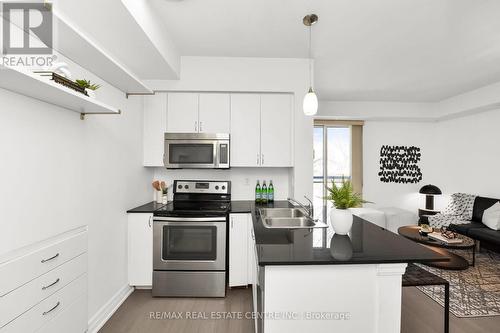 302 - 58 Macaulay Avenue, Toronto, ON - Indoor Photo Showing Kitchen With Double Sink