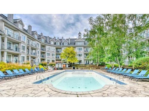 Piscine - 344-444-160 Ch. Du Curé-Deslauriers, Mont-Tremblant, QC - Outdoor With In Ground Pool With Balcony