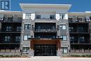 430 - 110 Fergus Avenue W, Kitchener, ON  - Outdoor With Balcony With Facade 