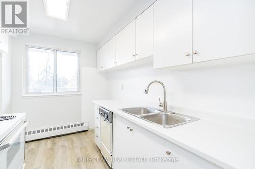 205 - 414 Blake Street, Barrie, ON - Indoor Photo Showing Kitchen With Double Sink
