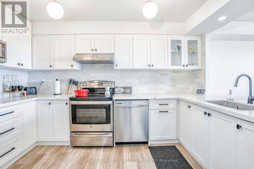 1411 - 3845 Lake Shore Boulevard, Toronto, ON - Indoor Photo Showing Kitchen With Upgraded Kitchen