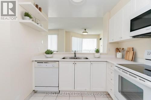610 - 2177 Burnhamthorpe Road W, Mississauga, ON - Indoor Photo Showing Kitchen With Double Sink