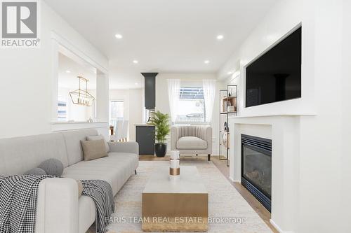 58 Girdwood Drive, Barrie, ON - Indoor Photo Showing Living Room With Fireplace