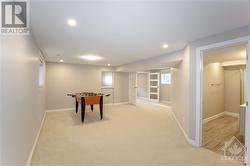 fully finished basement serves as an executive suite with oversized windows - 