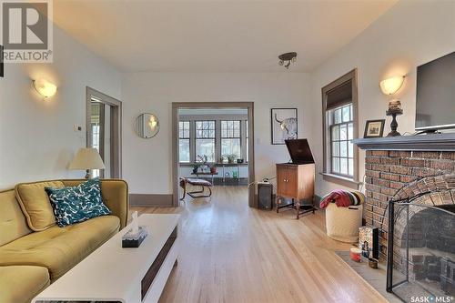 3438 Victoria Avenue, Regina, SK - Indoor Photo Showing Living Room With Fireplace