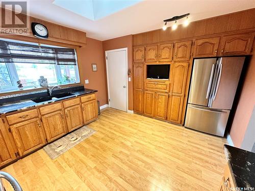 28 Hartney Bay, Weyburn, SK - Indoor Photo Showing Kitchen With Double Sink