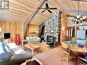 58 Chamakese Resort, Chitek Lake, Chitek Lake, SK  - Indoor Photo Showing Other Room With Fireplace 