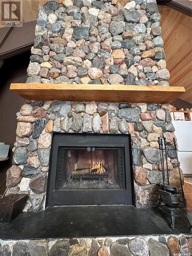 58 Chamakese Resort, Chitek Lake, Chitek Lake, SK - Indoor Photo Showing Living Room With Fireplace