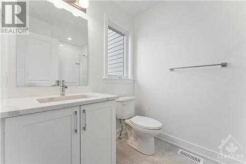 Ensuite with quartz counters on vanity - 314 Makobe Lane, Ottawa, ON - Indoor Photo Showing Bathroom