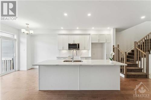 Bright white kitchen - 314 Makobe Lane, Ottawa, ON - Indoor Photo Showing Kitchen With Upgraded Kitchen