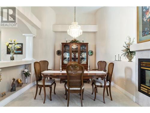 2602 Golf Course Drive, Blind Bay, BC - Indoor Photo Showing Dining Room With Fireplace