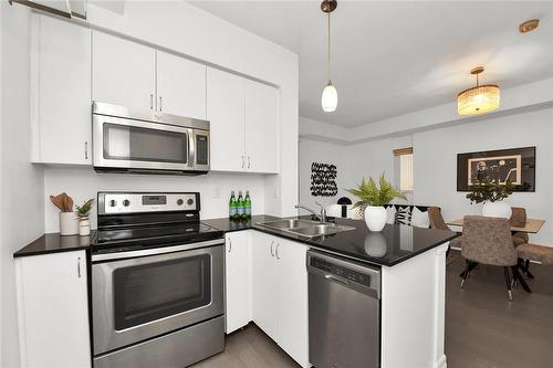 58 Macaulay Avenue|Unit #302, Toronto, ON - Indoor Photo Showing Kitchen With Double Sink