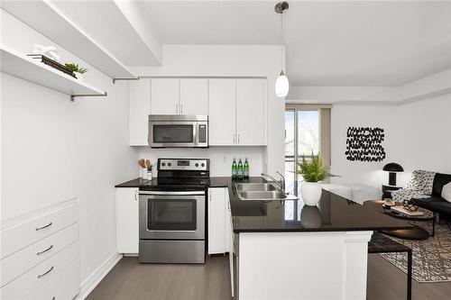 58 Macaulay Avenue|Unit #302, Toronto, ON - Indoor Photo Showing Kitchen With Double Sink