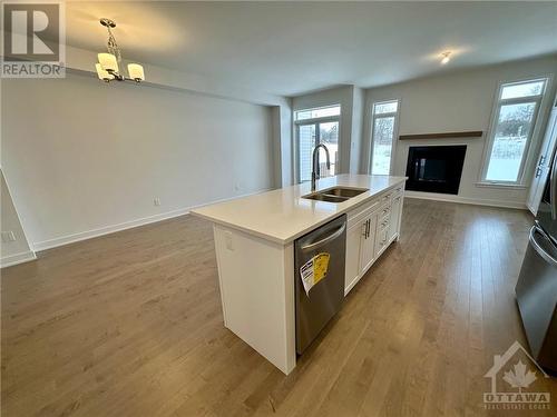 82 Bon Temps Way, Ottawa, ON - Indoor Photo Showing Kitchen With Fireplace With Double Sink