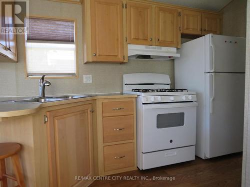 68 - 2189 Dundas Street E, London, ON - Indoor Photo Showing Kitchen With Double Sink