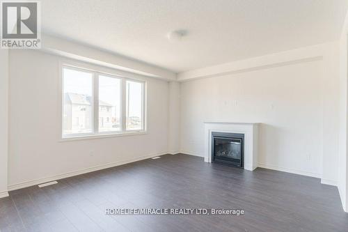 498 Hornbeck Street, Cobourg, ON - Indoor Photo Showing Living Room With Fireplace