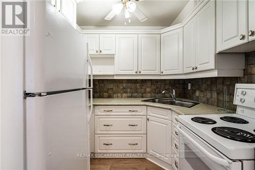 305 - 23 Main Street, Hamilton, ON - Indoor Photo Showing Kitchen With Double Sink