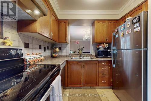 61 Mullis Crescent, Brampton, ON - Indoor Photo Showing Kitchen With Double Sink