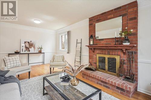 117 Warner Drive, Oakville, ON - Indoor Photo Showing Living Room With Fireplace