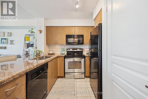 509 - 1600 Charles Street, Whitby, ON - Indoor Photo Showing Kitchen With Stainless Steel Kitchen With Double Sink