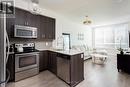 326 - 7608 Yonge Street, Vaughan, ON  - Indoor Photo Showing Kitchen With Double Sink With Upgraded Kitchen 